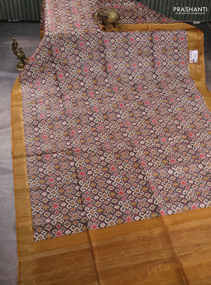 Munga tussar silk saree grey and mustard yellow with allover ikat prints and zari woven border