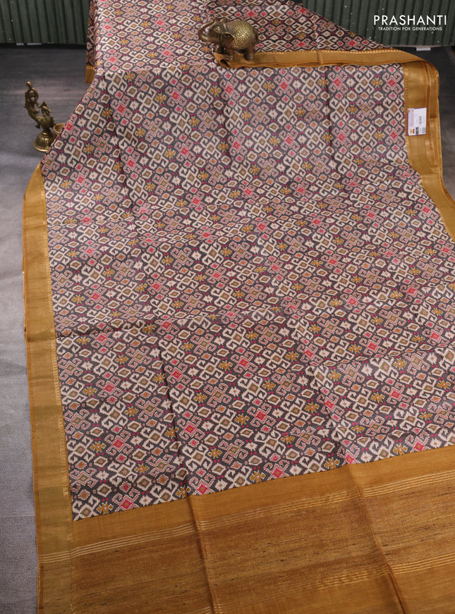Munga tussar silk saree grey and mustard yellow with allover ikat prints and zari woven border