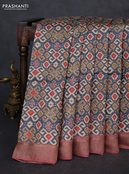 Munga tussar silk saree blue and pastel maroon with allover ikat prints and zari woven border