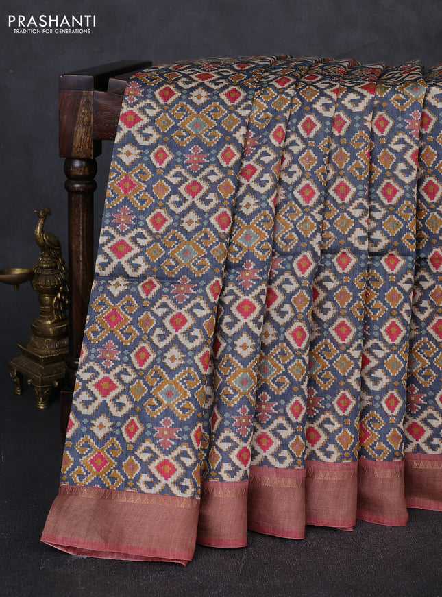 Munga tussar silk saree blue and pastel maroon with allover ikat prints and zari woven border