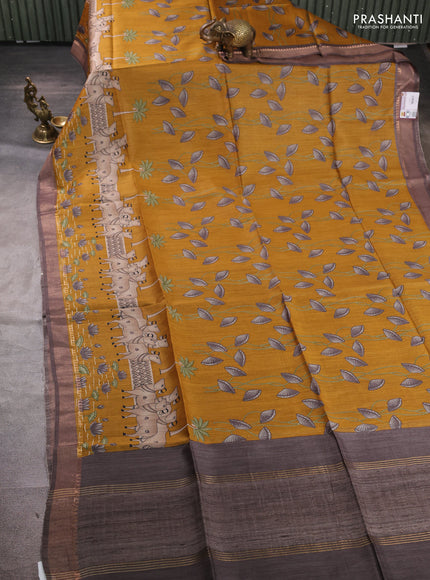 Munga tussar silk saree mustard yellow and grey with allover pichwai prints and zari woven border