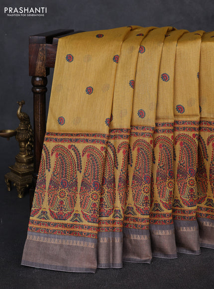 Munga tussar silk saree mustard yellow and grey with allover butta prints and zari woven border