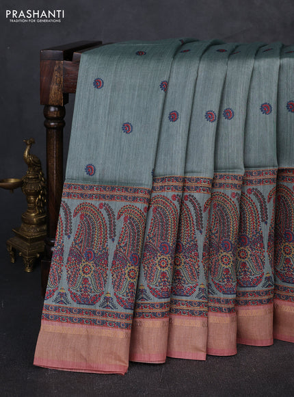 Munga tussar silk saree pastel green shade and dark peach with allover butta prints and zari woven border
