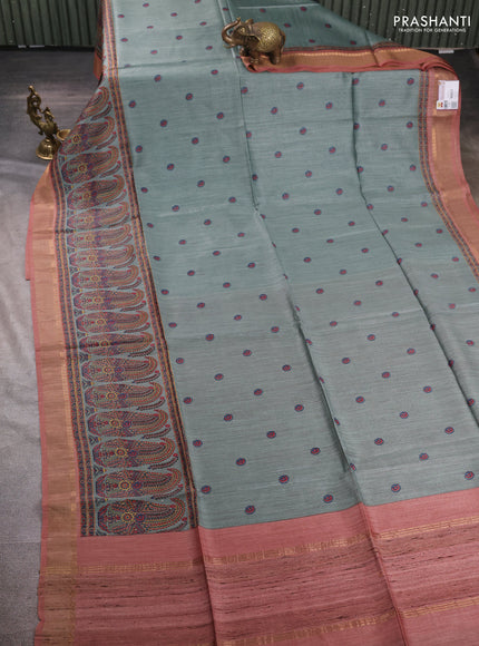 Munga tussar silk saree pastel green shade and dark peach with allover butta prints and zari woven border
