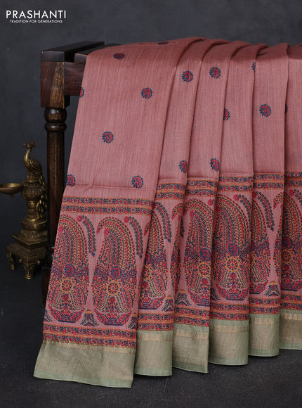 Munga tussar silk saree pastel peach and green with allover butta prints and zari woven border