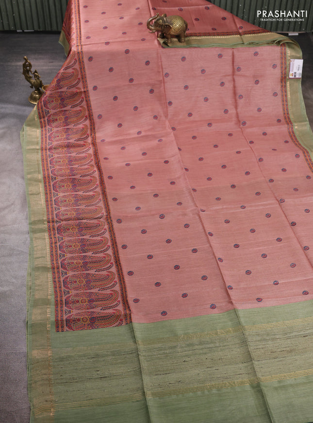 Munga tussar silk saree pastel peach and green with allover butta prints and zari woven border