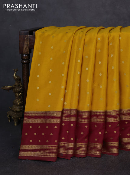 Pure mysore silk saree mango yelloe and rust shade with allover zari woven buttas and zari woven border