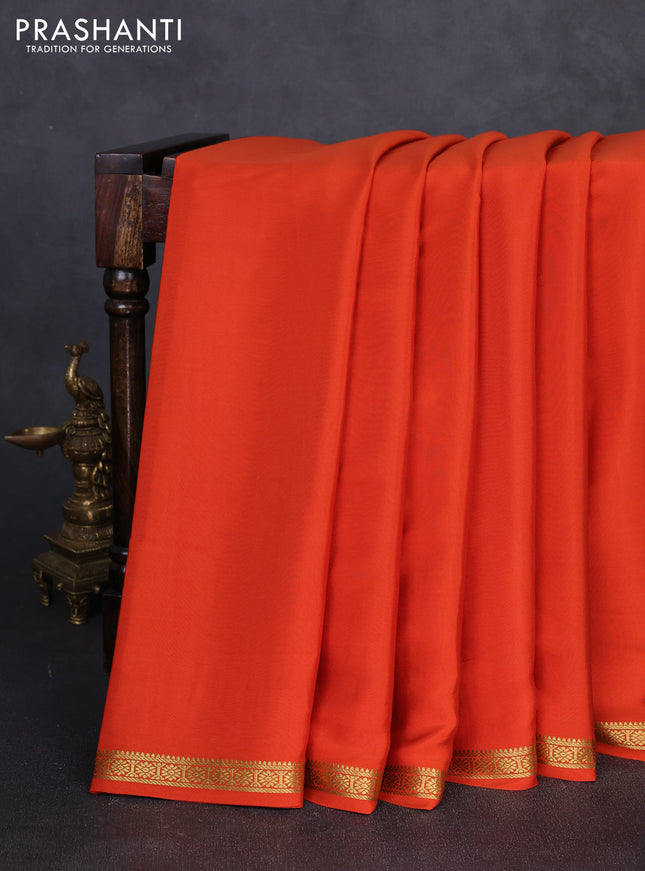 Pure mysore silk saree orange with plain body and small zari woven border