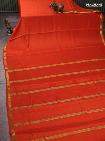Pure mysore silk saree orange with plain body and small zari woven border