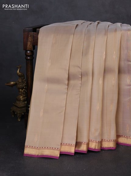 Kanchipuram silk saree beige and pink with zari woven buttas and small zari woven border