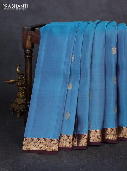 Kanchipuram silk saree pastel blue and brown with zari woven buttas and small zari woven border