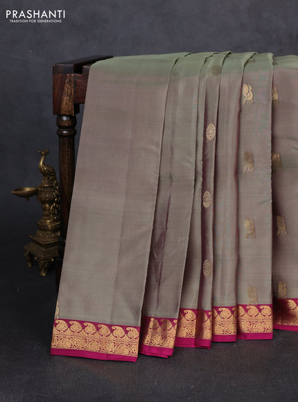 Kanchipuram silk saree dual shade of elaichi green and magenta pink with zari woven buttas and small zari woven border