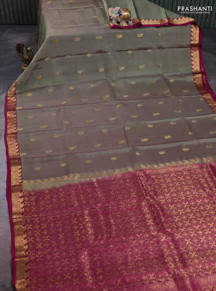 Kanchipuram silk saree dual shade of elaichi green and magenta pink with zari woven buttas and small zari woven border