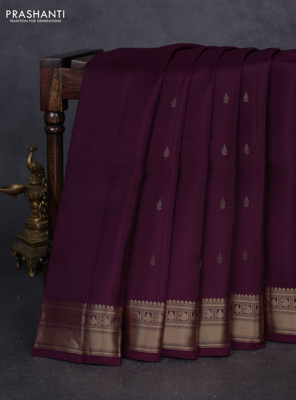 Kanchipuram silk saree wine shade with allover zari woven buttas and rich zari woven border