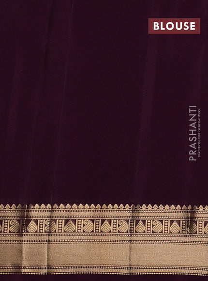 Kanchipuram silk saree wine shade with allover zari woven buttas and rich zari woven border