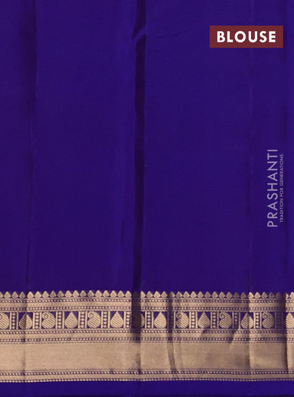 Kanchipuram silk saree violet with allover zari woven buttas and rich zari woven border