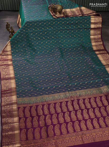 Kanchipuram silk saree teal green and wine shade with allover zari woven buttas and rich zari woven border