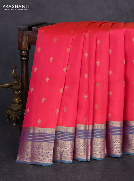 Kanchipuram silk saree tomato pink and dual shade of teal green with allover zari woven buttas and zari woven border