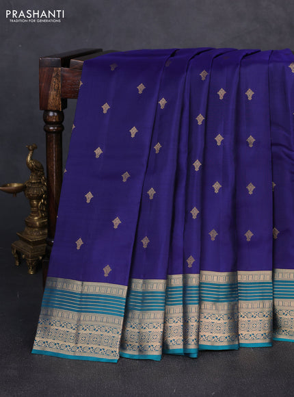 Kanchipuram silk saree navy blue and teal green with allover zari woven buttas and zari woven border