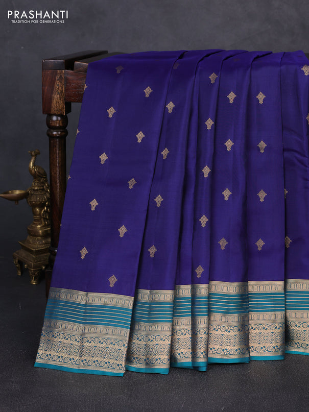 Kanchipuram silk saree navy blue and teal green with allover zari woven buttas and zari woven border
