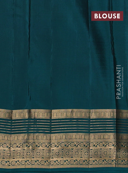 Kanchipuram silk saree purple and teal green with allover zari woven buttas and zari woven border