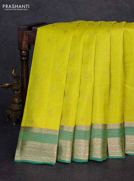 Kanchipuram silk saree lime yellow and teal green with allover zari woven buttas and zari woven border