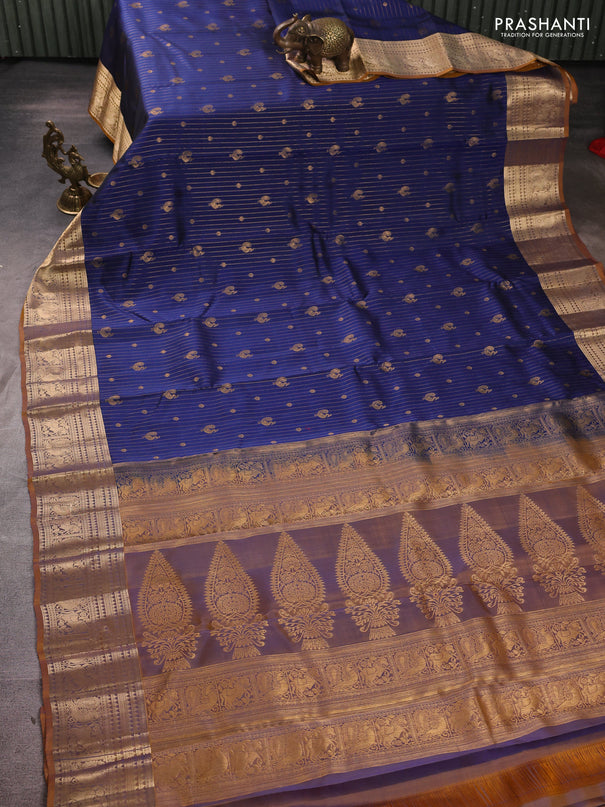 Kanchipuram silk saree navy blue and mustard shade with allover zari weaves & buttas and zari woven border