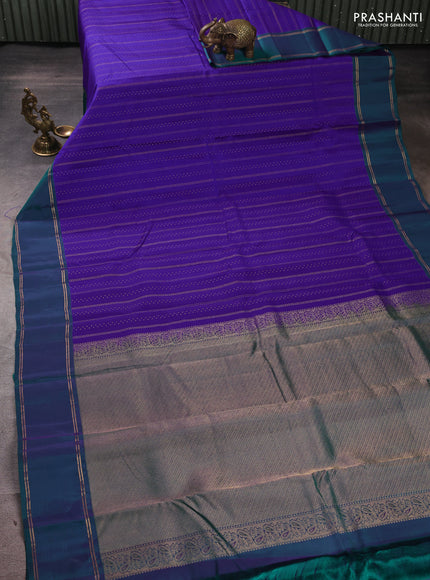 Kanchipuram silk saree violet and peacock green with allover zari weaves and rettapet zari woven border