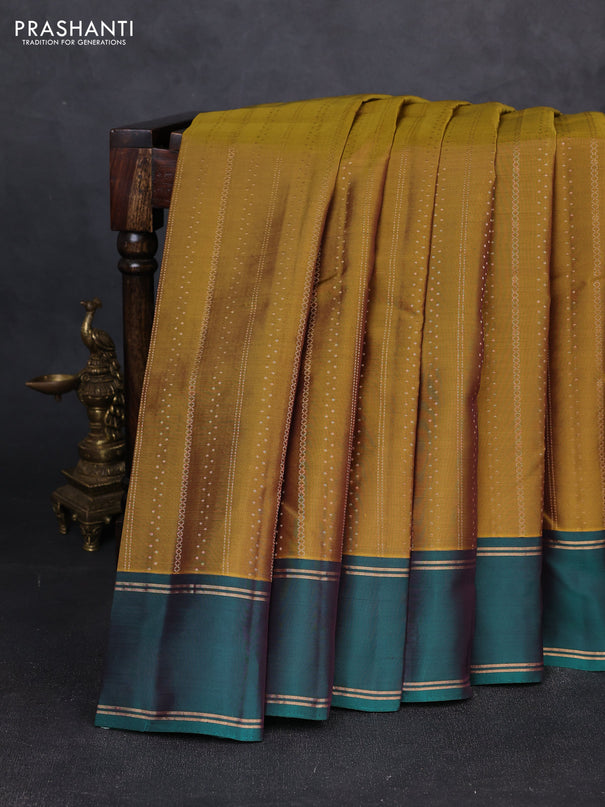Kanchipuram silk saree mustard green and bottle green with allover zari weaves and rettapet zari woven border