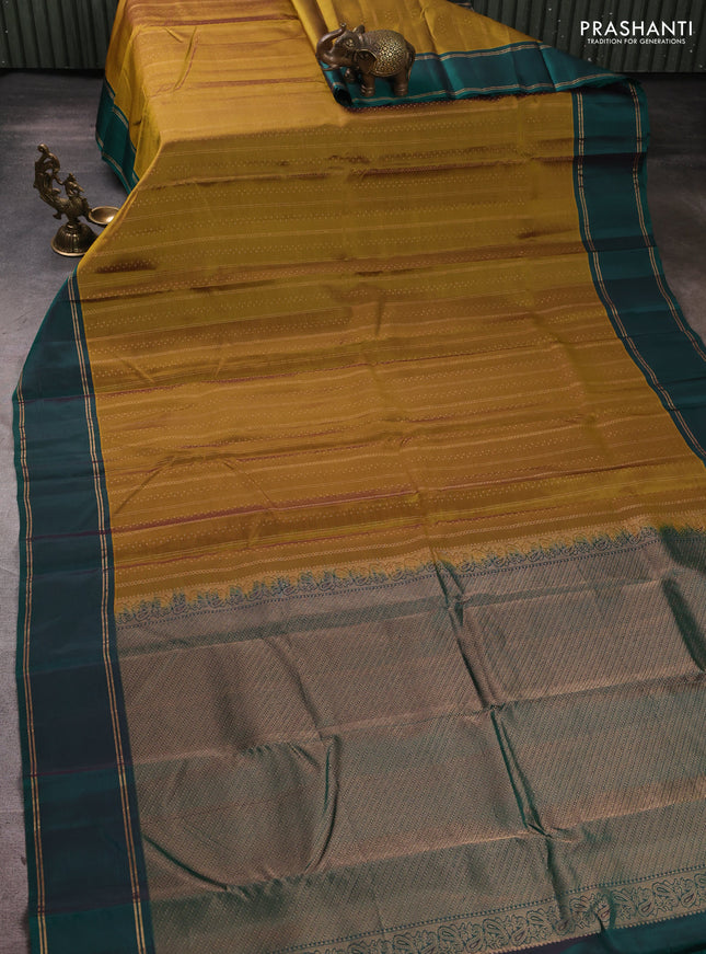 Kanchipuram silk saree mustard green and bottle green with allover zari weaves and rettapet zari woven border