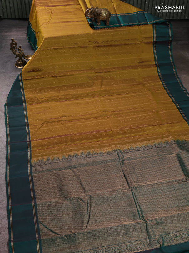 Kanchipuram silk saree mustard green and bottle green with allover zari weaves and rettapet zari woven border