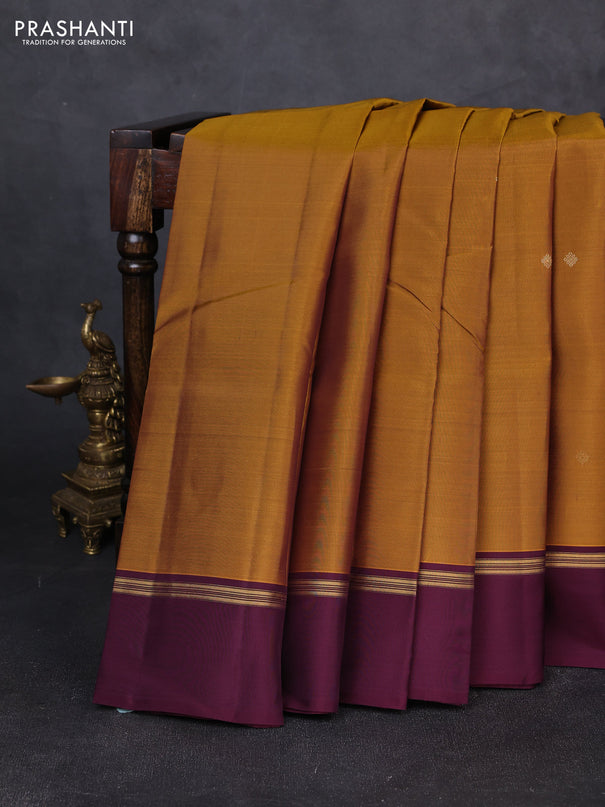 Kanchipuram silk saree mustard yellow and wine shade with zari woven buttas and zari woven simple border