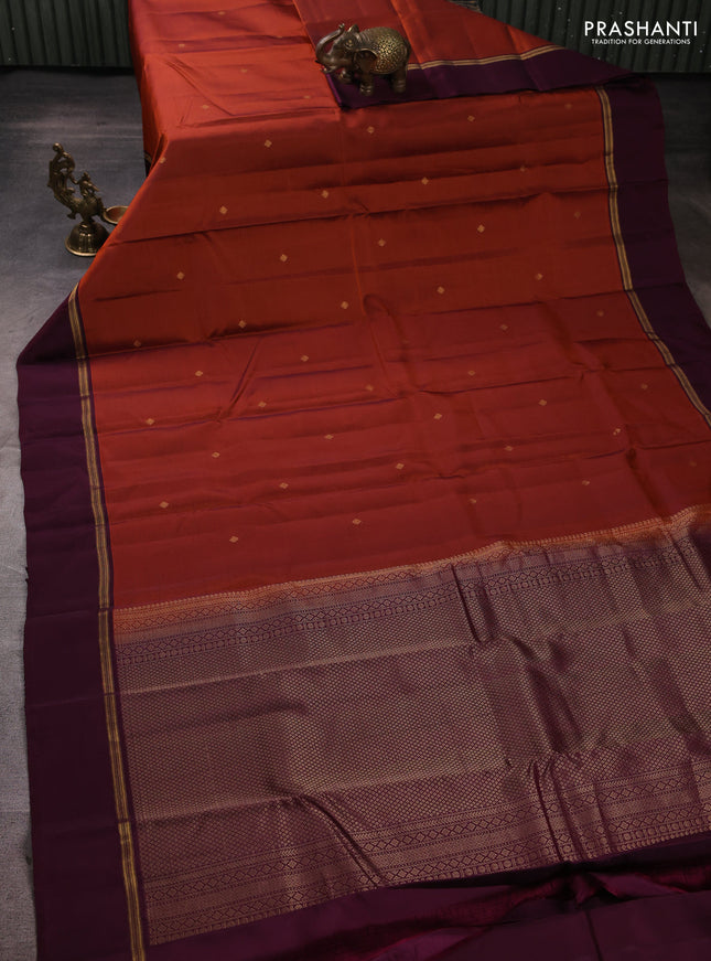 Kanchipuram silk saree rust shade and wine shade with allover zari woven buttas and zari woven simple border