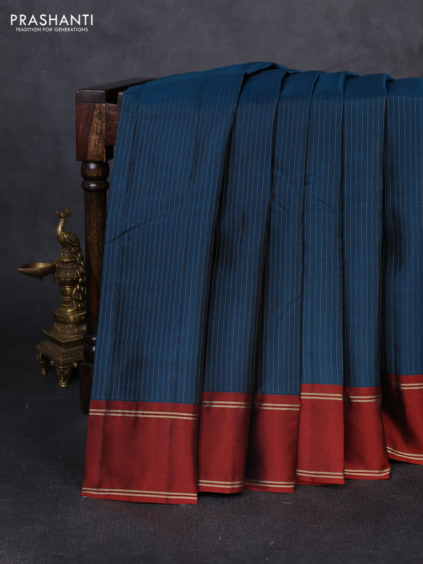 Kanchipuram silk saree peacock blue and maroon with allover zari weaves and rettapet zari woven border