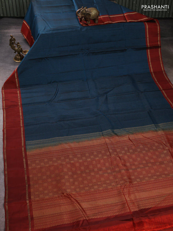 Kanchipuram silk saree peacock blue and maroon with allover zari weaves and rettapet zari woven border