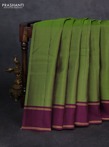 Kanchipuram silk saree light green and wine shade with allover zari weaves and rettapet zari woven border