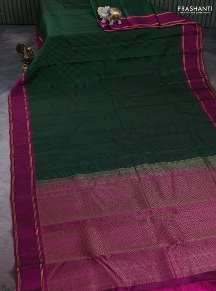 Kanchipuram silk saree bottle green and magenta pink with allover zari weaves and rettapet zari woven border