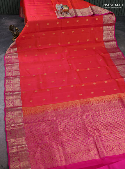 Kanchipuram silk saree dual shade of pinkish orange and pink with zari woven buttas and zari woven border