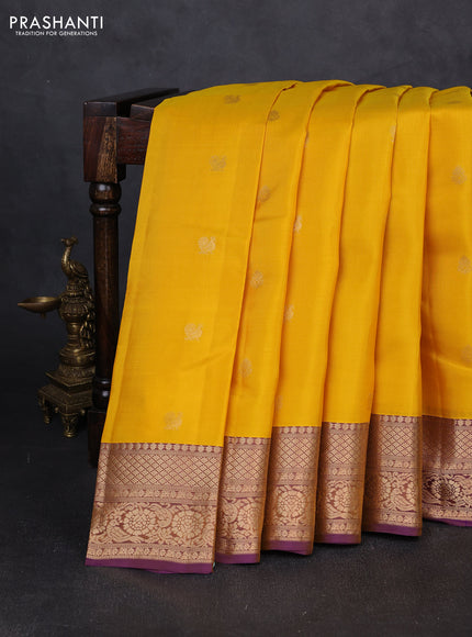 Kanchipuram silk saree yellow and purple with zari woven buttas and zari woven border