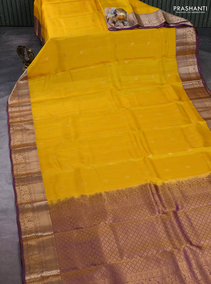 Kanchipuram silk saree yellow and purple with zari woven buttas and zari woven border
