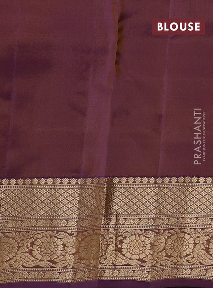 Kanchipuram silk saree yellow and purple with zari woven buttas and zari woven border