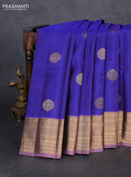 Kanchipuram silk saree blue and pastel purple with zari woven buttas and zari woven border