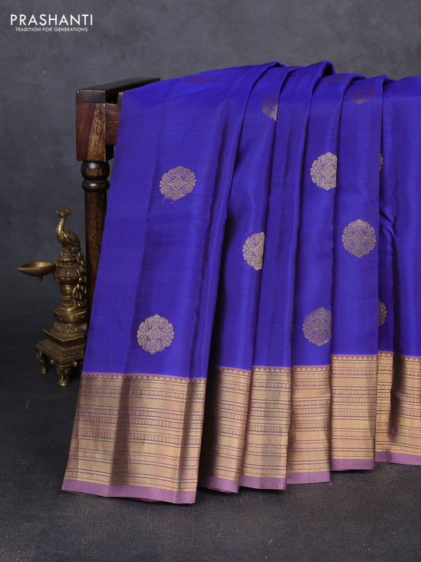 Kanchipuram silk saree blue and pastel purple with zari woven buttas and zari woven border