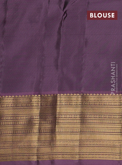 Kanchipuram silk saree blue and pastel purple with zari woven buttas and zari woven border