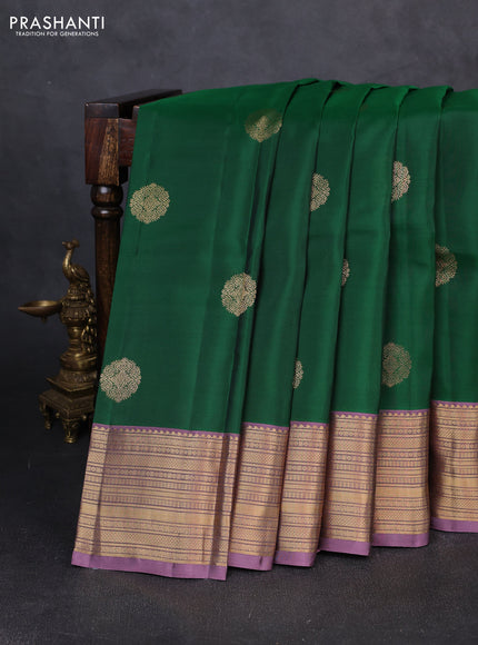 Kanchipuram silk saree green and pastel purple with zari woven buttas and zari woven border