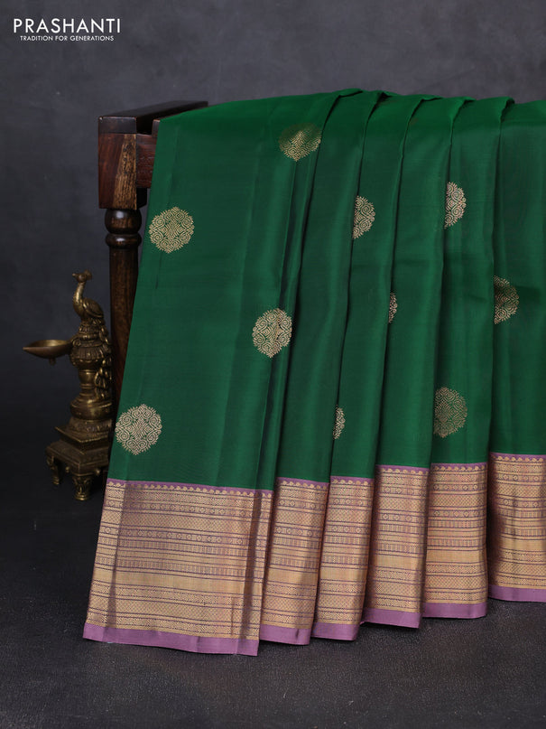 Kanchipuram silk saree green and pastel purple with zari woven buttas and zari woven border