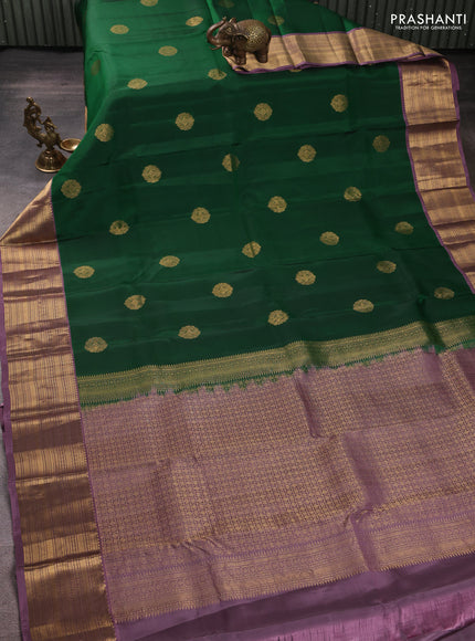Kanchipuram silk saree green and pastel purple with zari woven buttas and zari woven border