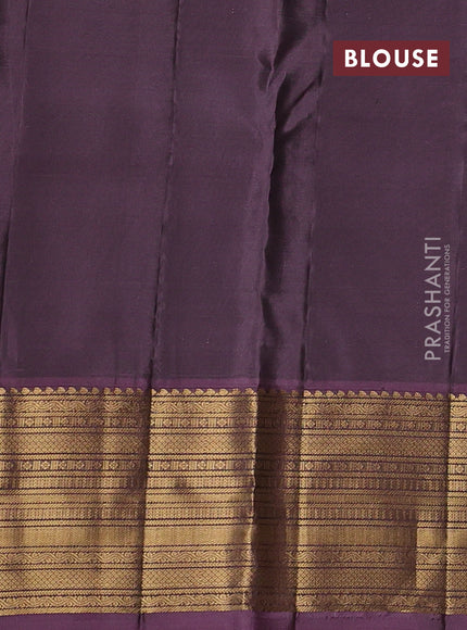 Kanchipuram silk saree green and pastel purple with zari woven buttas and zari woven border
