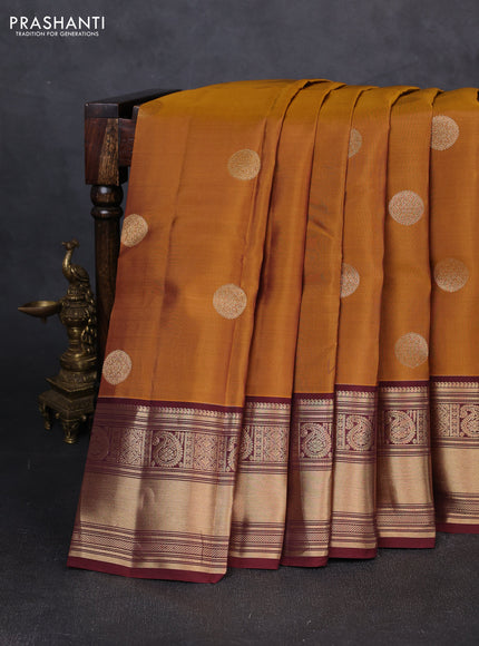 Kanchipuram silk saree mustard yellow and maroon shade with zari woven buttas and rich zari woven border