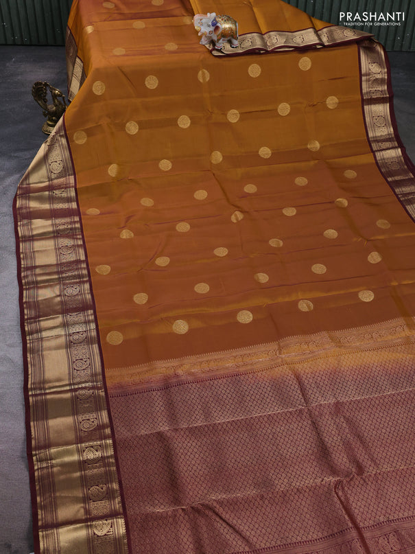 Kanchipuram silk saree mustard yellow and maroon shade with zari woven buttas and rich zari woven border